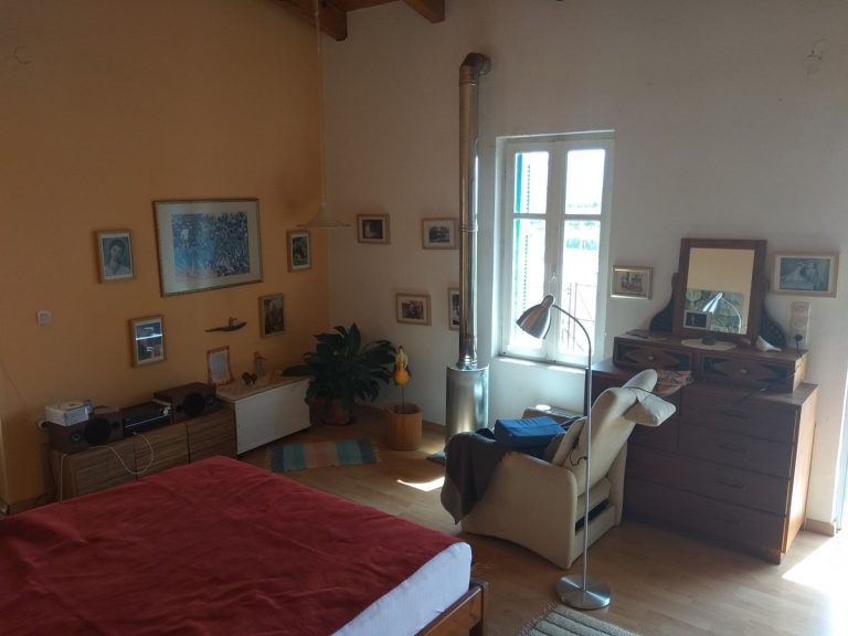 Stone house for sale Chania area bedroom armchair