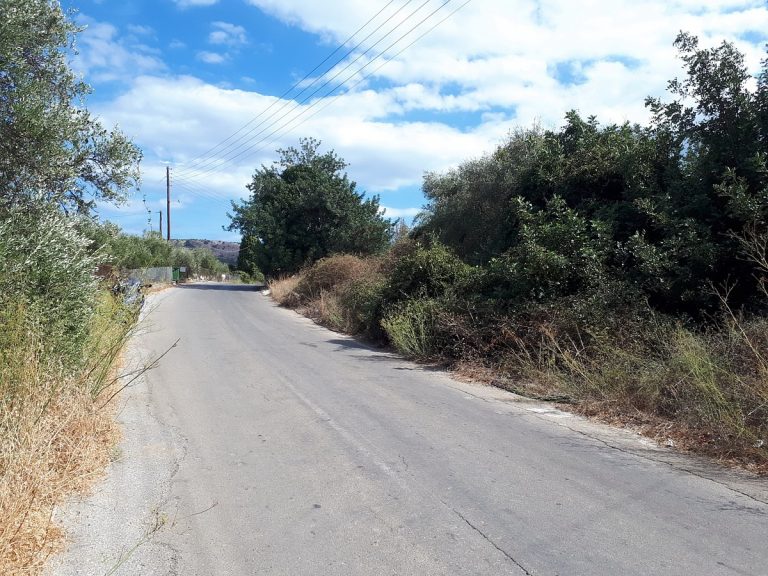 land for sale in crete aspahlt road