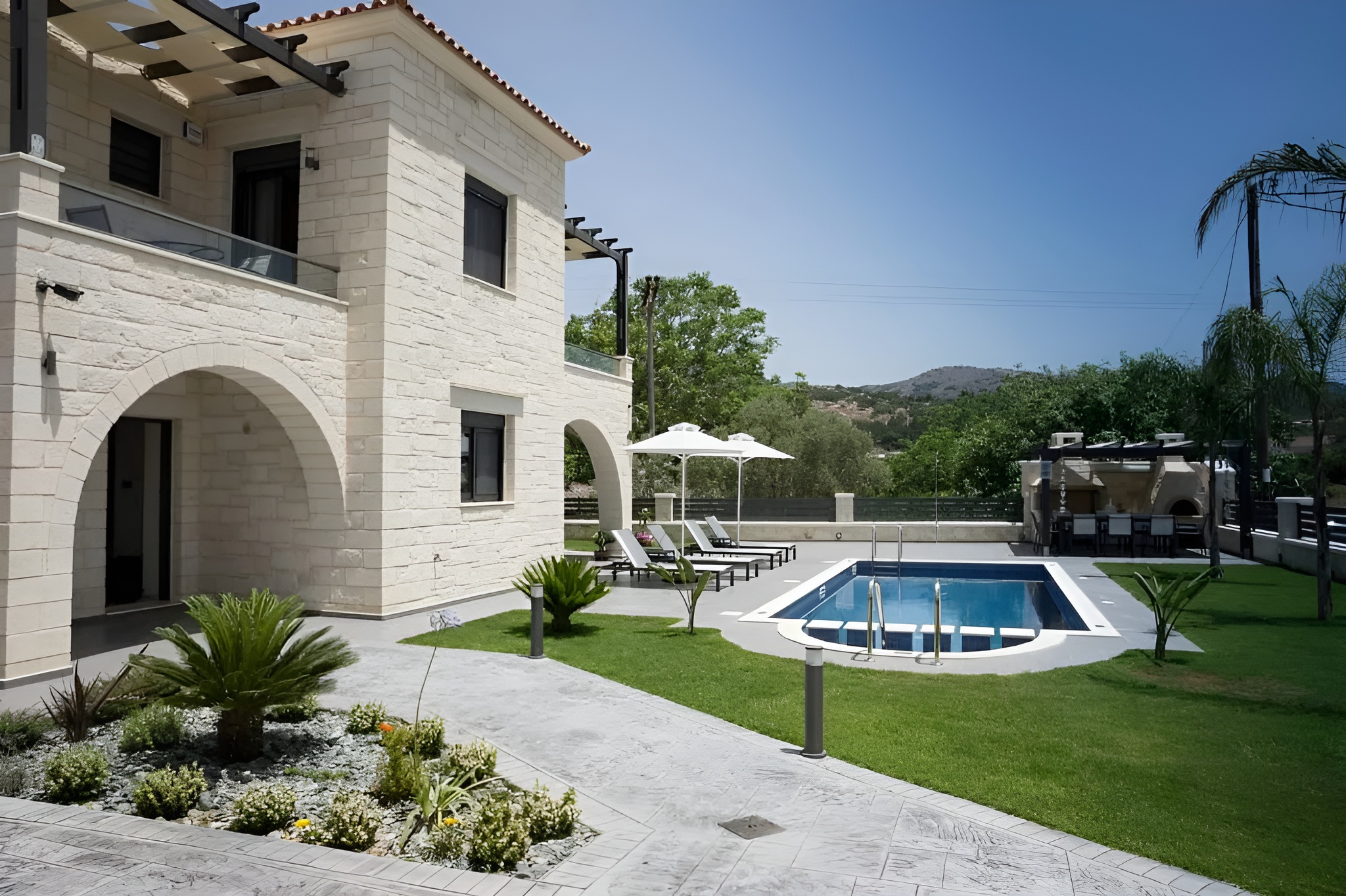 Exterior photo of stone villa in Almyrida