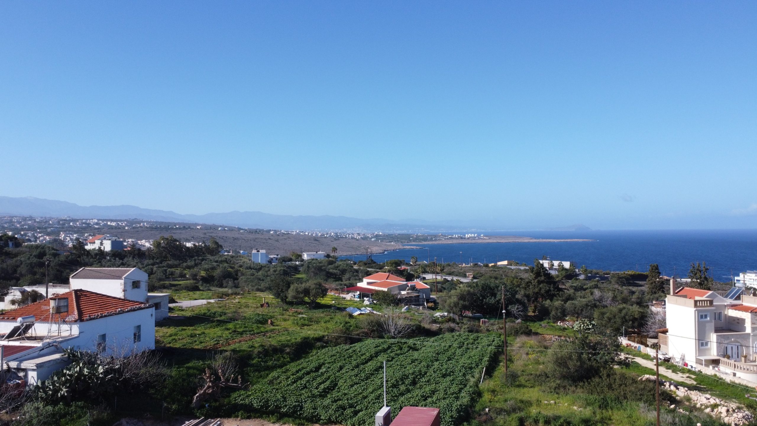 aerial photo of the sea and mountian views of prime buildable plot for sale in akrotiri