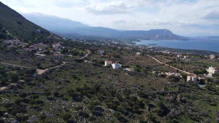 drone photo of the area around the plot with the sea and mountain views