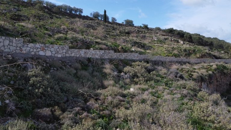 Traditional stone walls on land plot for sale in Malaxa, Crete