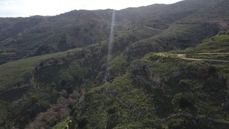 Green hills surrounding land plot for sale in Keramia, Crete countryside