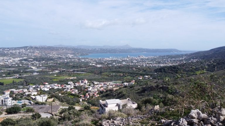 Panoramic sea and mountain views from land in Malaxa, Crete