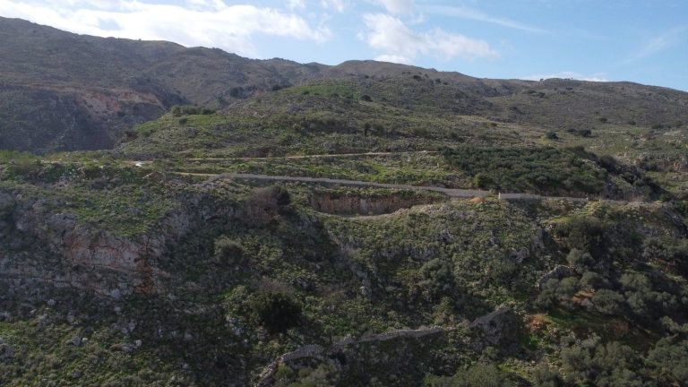esidential building plot on green hillside with scenic views