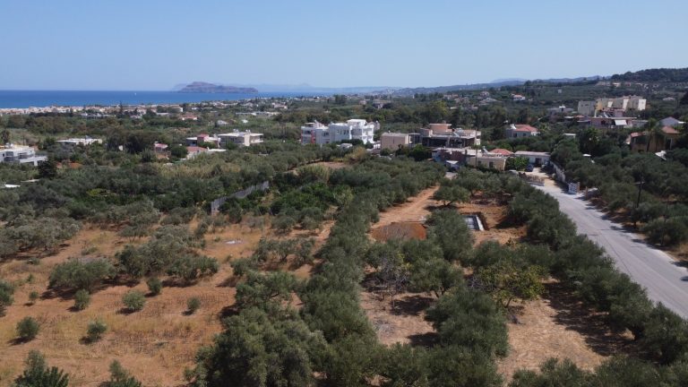 Aerial shot showing sea views and surrounding olive groves of Maleme villa project plot