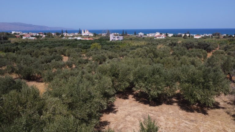 Drone view of Maleme development plot near the beach with panoramic sea views