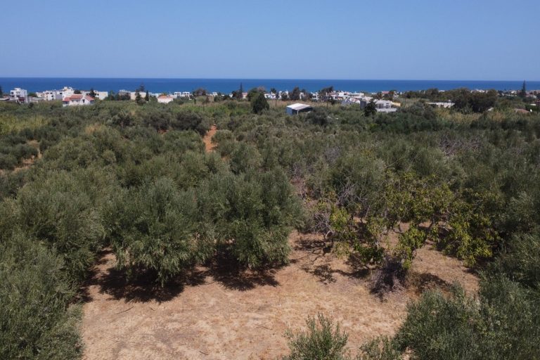 Aerial photo of building plot in Maleme Crete with sea and sunset views over the north coast