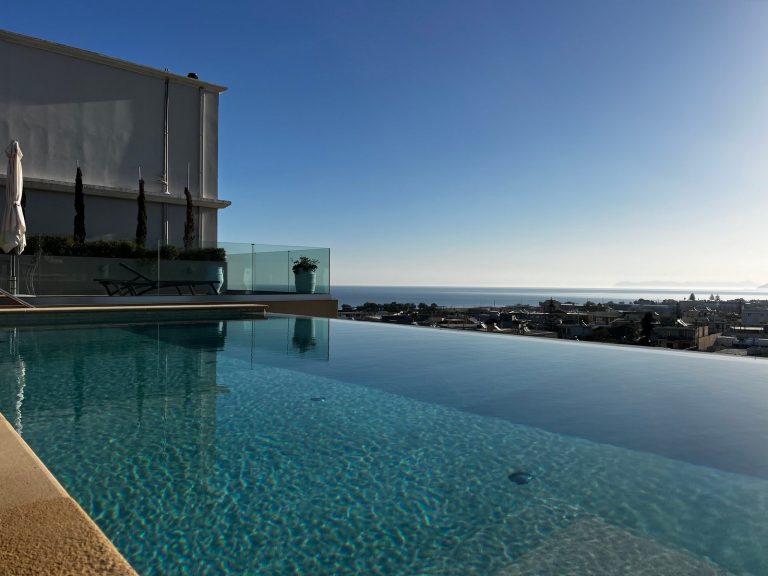 Infinity swimming pool at property for sale in Kolymbari with sea views