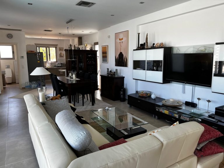 Spacious kitchen and living room in modern property for sale in kolymbari