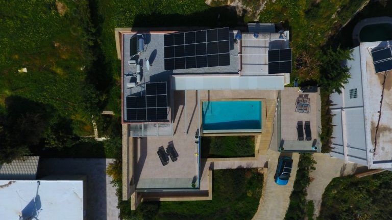 Bird’s-eye view of villa with surrounding landscape