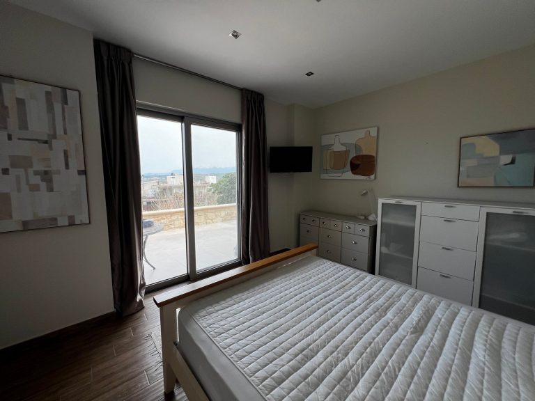 spacious bedroom with stunning mountain views in villa for sale