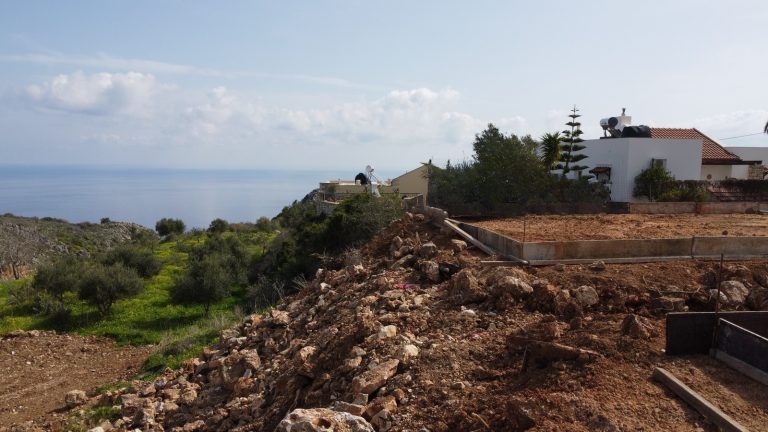Aerial perspective of coastal mountains and sea views
