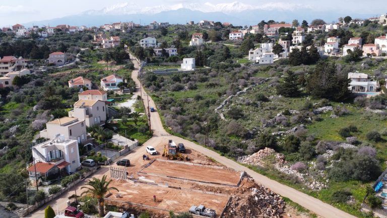 Drone view of scenic coastline with mountain views