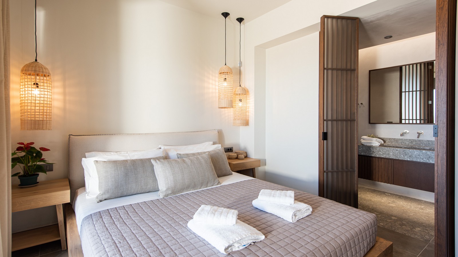 Elegant bedroom in a luxury villa in Crete with modern interior design