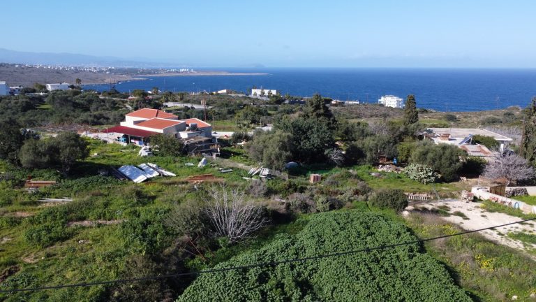 Overhead drone photo of Chorafakia plot with sea views