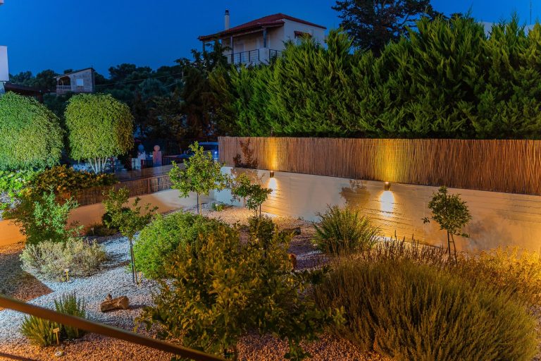 Garden area of villa in Pigianos Kampos Crete with outdoor seating and greenery