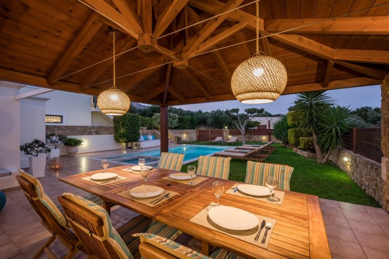 Charming villa in Afrata Crete with landscaped garden, pool, pergola dining space and outdoor stone BBQ