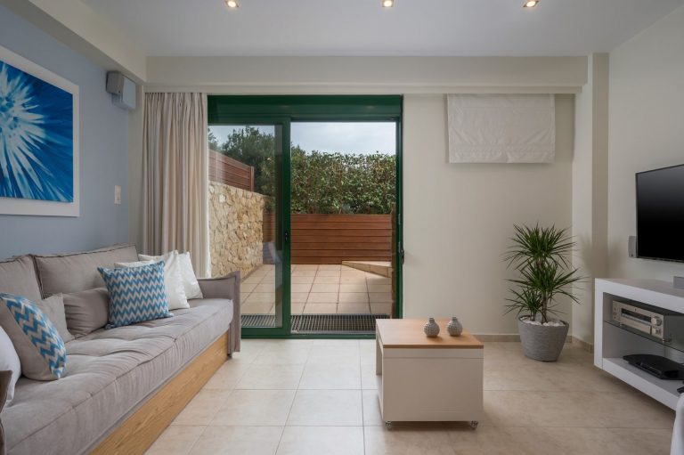 Comfortable indoor seating area in Afrata property for sale