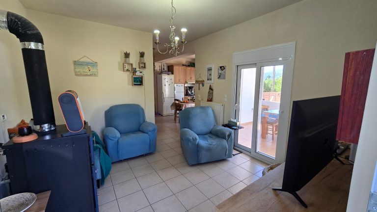 Living room with balcony doors and terrace
