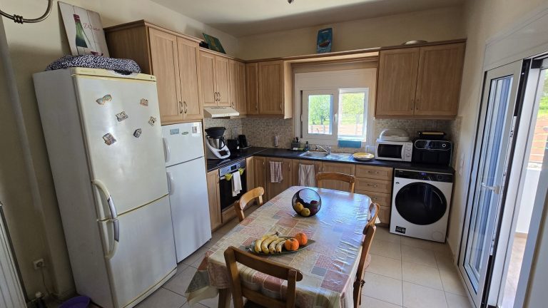 Bright kitchen with balcony doors