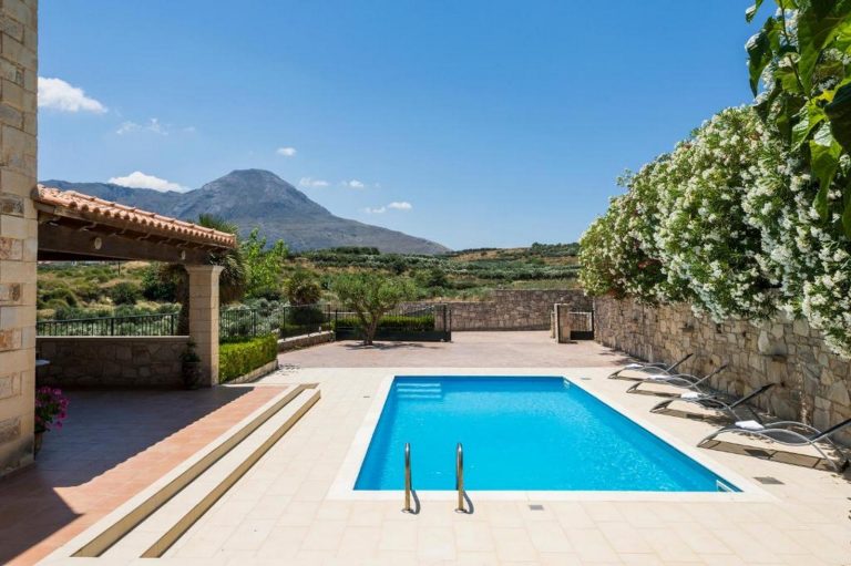 Traditional stone villa in Platanos Falassarna featuring swimming pool and panoramic sea views