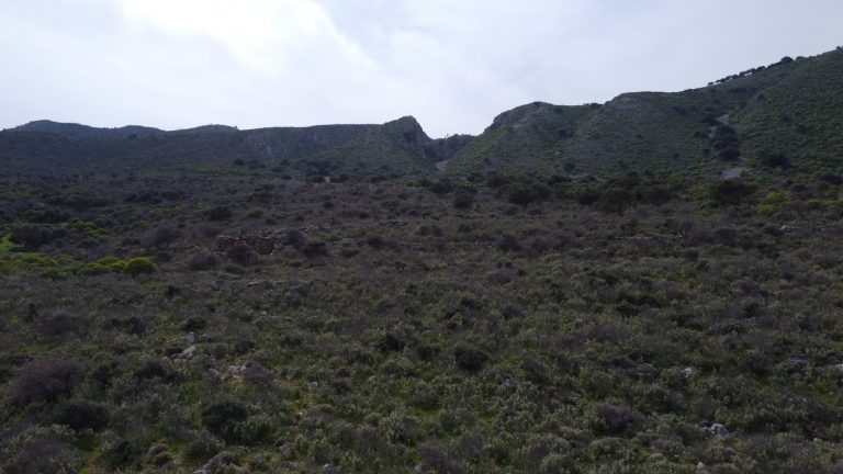 High-Angle View of Hilltop Plot with Endless Blue Sea Scenery