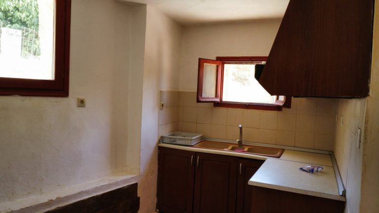 kitchen in stone house in property for sale in chania