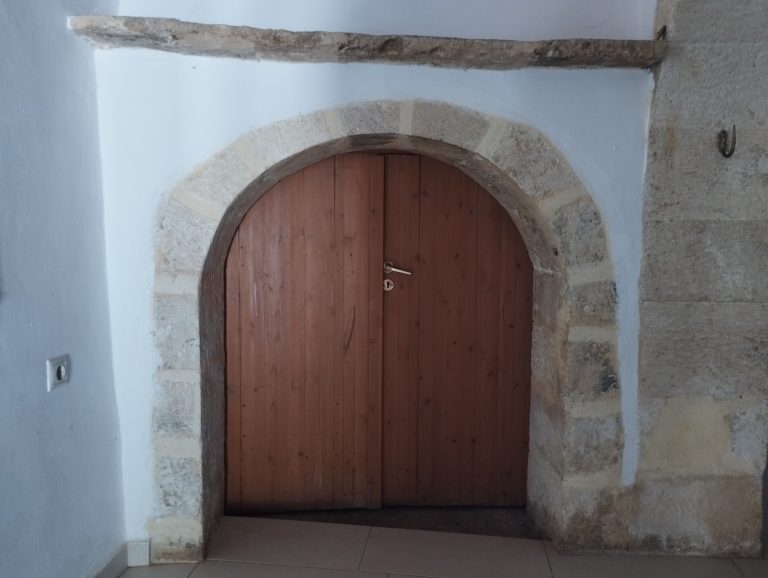 arched stone door in beautiful traditional property for sale in apokoronas