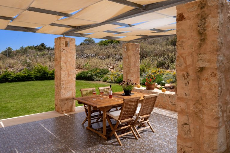 Covered Outdoor Dining Area with BBQ and Stunning Sea Views
