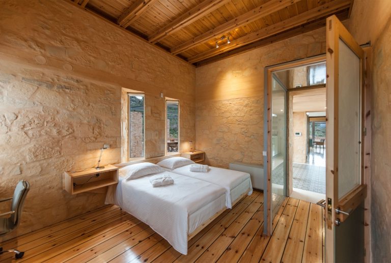 Comfortable Wooden Bedroom Offering Tranquil Views of the Surrounding Area