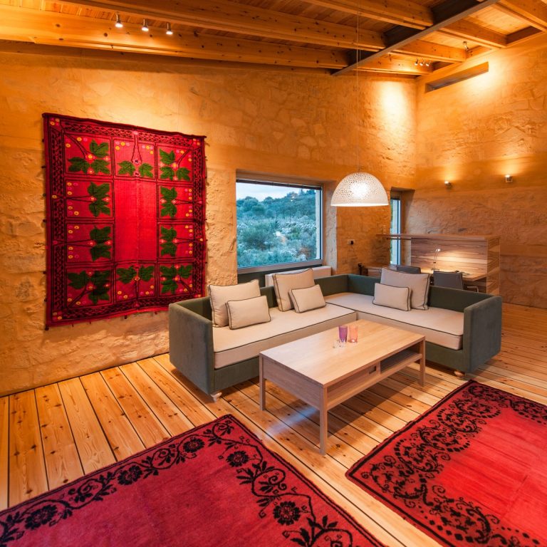 Cozy Wooden Living Room with Large Windows and Scenic Views