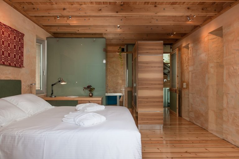 Inviting Bedroom with Panoramic Windows and Countryside Views