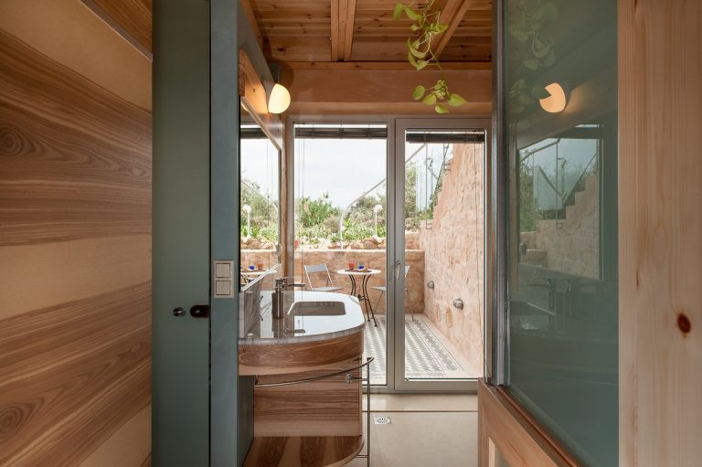 Elegant Bathroom with Warm Wooden Details and Natural Light